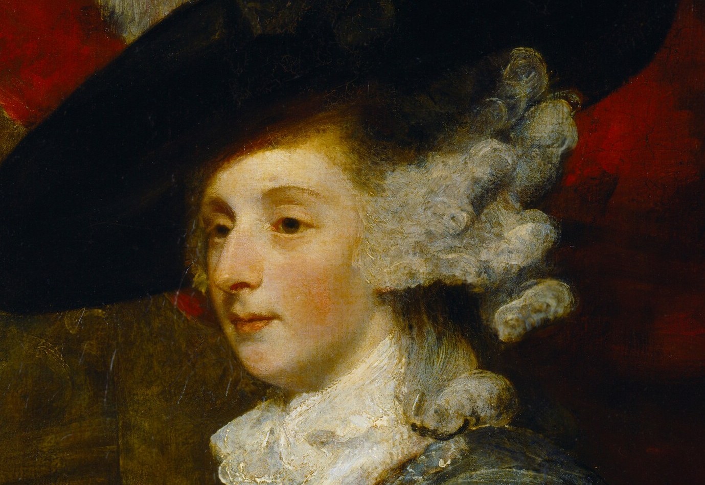 The wide brim and feather embellishments are characteristic of late 18th-century fashion, adding to her status.