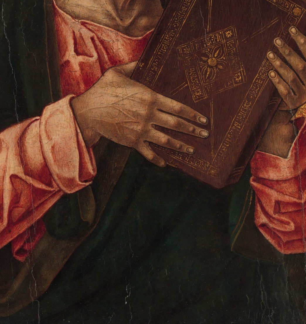 Look at what he's holding.