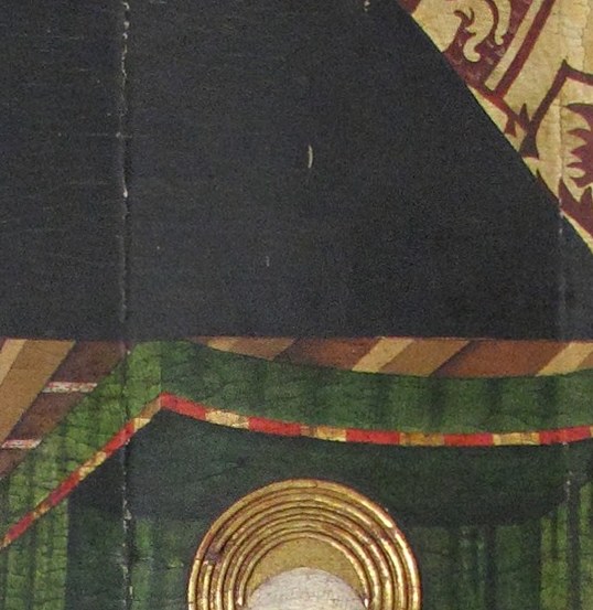 The gold leaf halo is the most luminous element in the painting; up close it may reveal tooling marks or punchwork patterns typical of 15th-century Aragonese altarpiece technique.