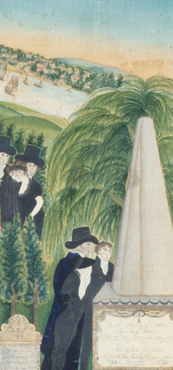 The dominant vertical anchor of the composition; its clean white surface likely carries an inscription and draws the eye as the symbolic stand-in for the deceased.