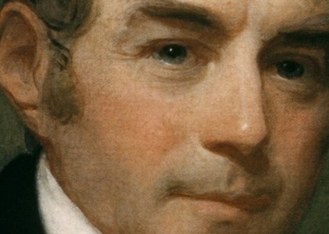Eustis's direct gaze conveys a sense of quiet gravitas.
