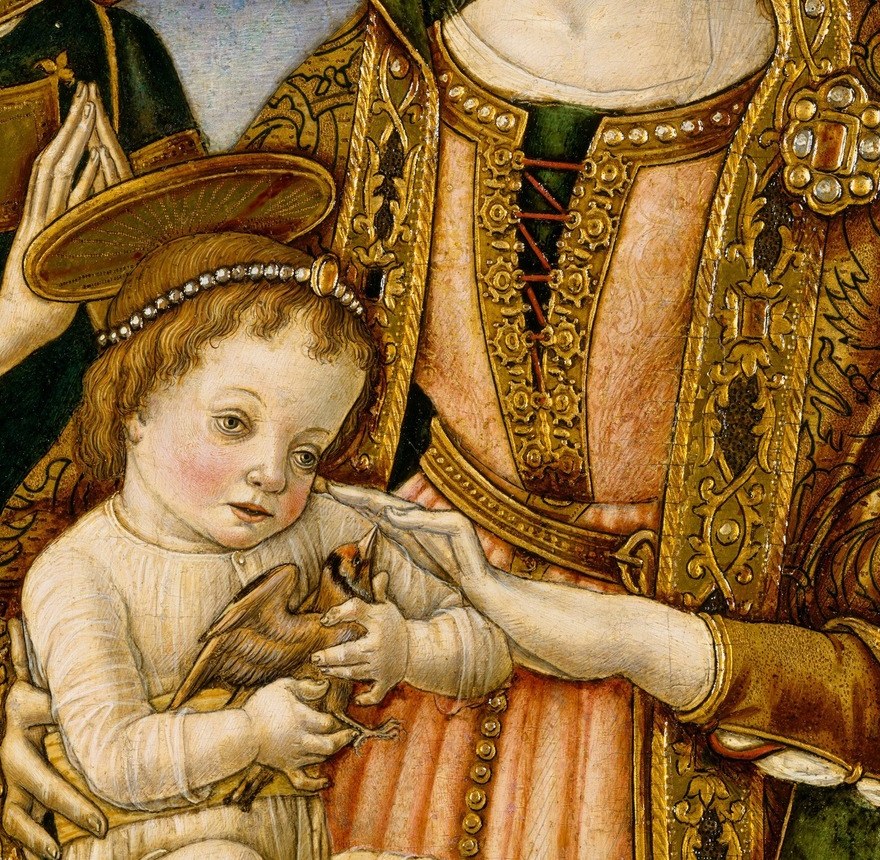 The child reaches toward the bird he holds, animating the devotional symbol of the Passion with a naturalistic infant gesture.
