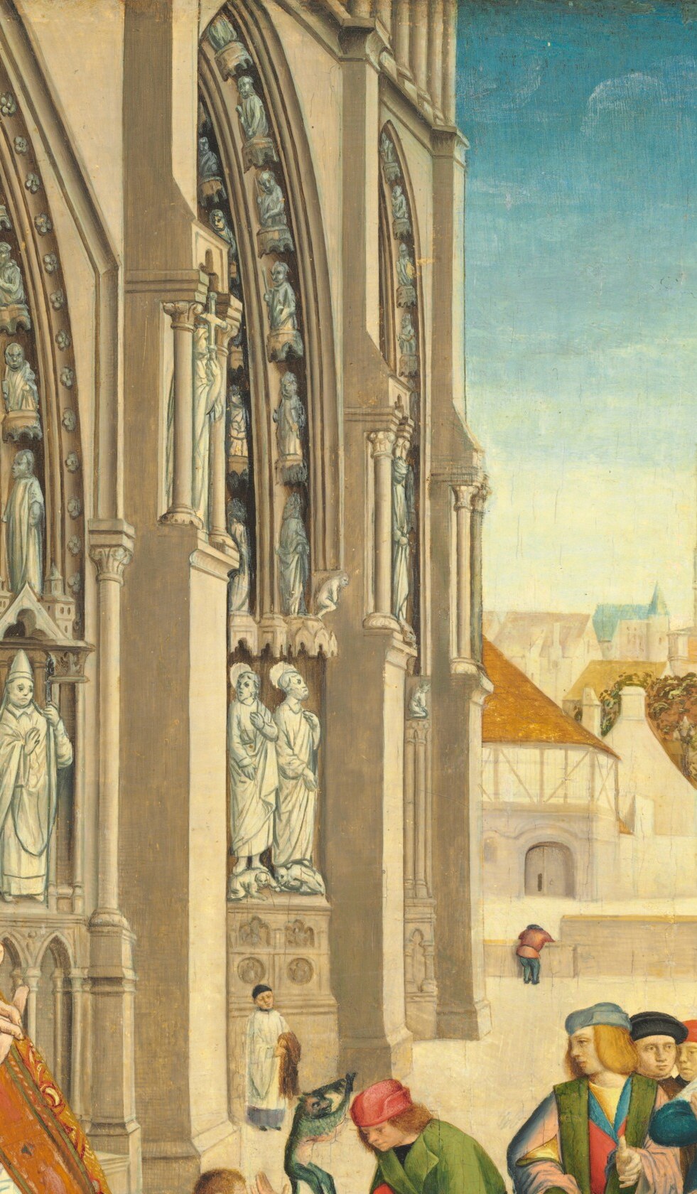Look closely at the ornate church facade behind him.