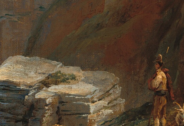 The textured rocks provide a sense of scale and the challenging nature of the landscape.