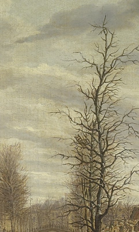 A stark tree stands like a skeleton.