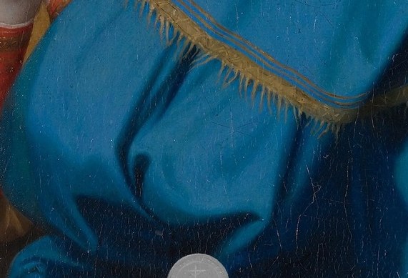 The theological center of the painting , the small white disk radiates the entire meaning of the scene; everything else in the composition bows toward it.