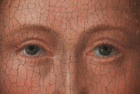 His eyes hold deep, knowing wisdom.