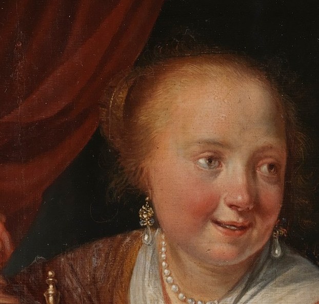 Her direct, calm gaze creates an intimate connection with the viewer, inviting contemplation.
