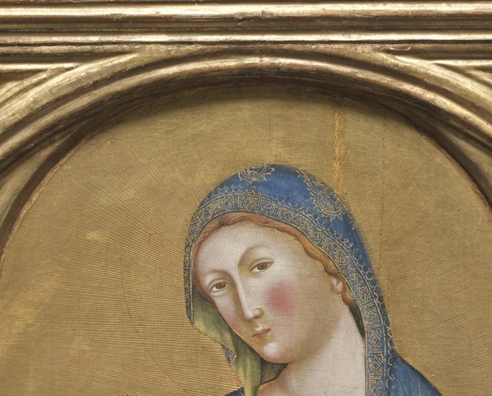 Queen of Heaven, seated in the dust. That tension is the theology.