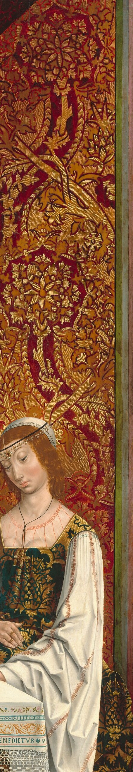 Dense gilt interlace decoration in the Isabelline Plateresque style , one of the clearest markers of Spanish patronage in the period; frames the composition like a reliquary border