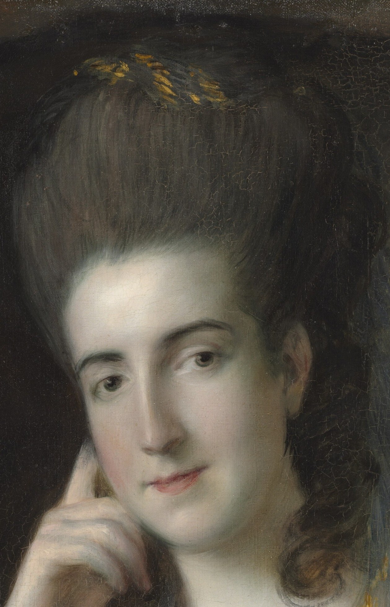 Gainsborough painted her hair high and powdered.