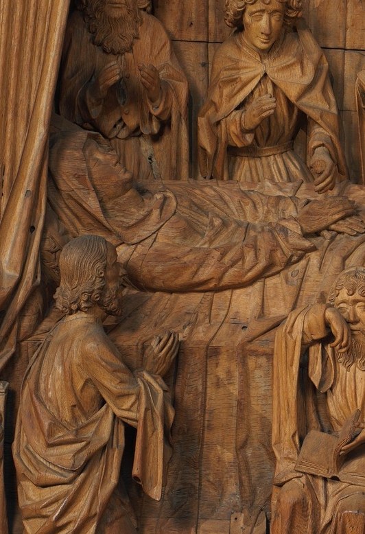 Look at the deep cuts in the drapery.