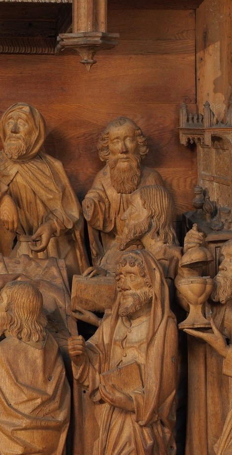 The book at center holds the prayers for the dying.