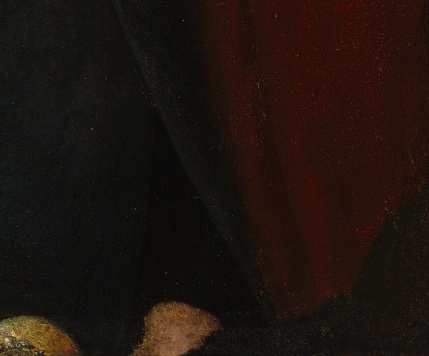 And his hands are clasped with calm.
