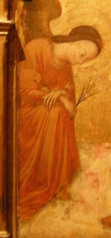 Gabriel's orange robe signifies the divine messenger.