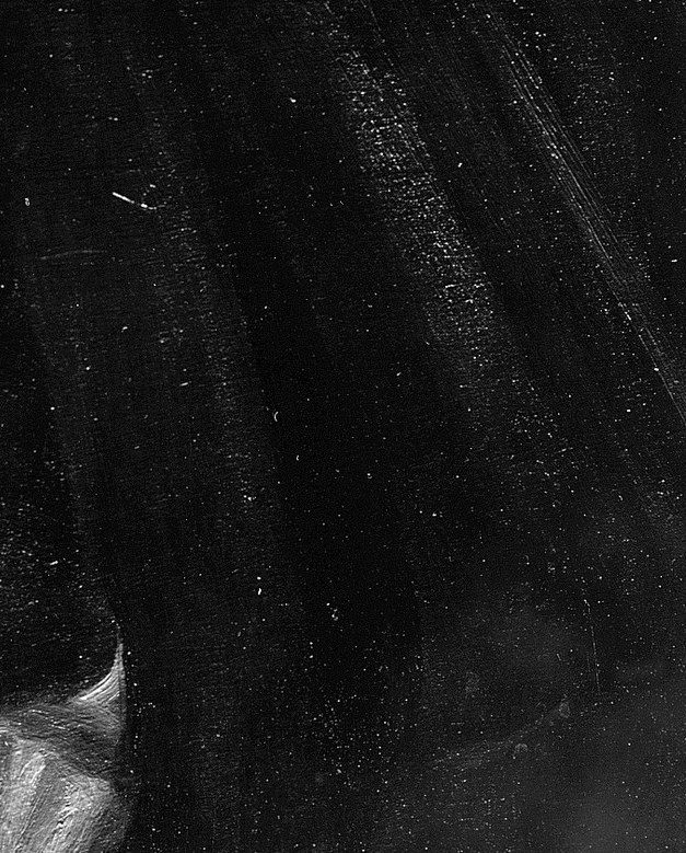 Look closely at the texture of her dark cloak.
