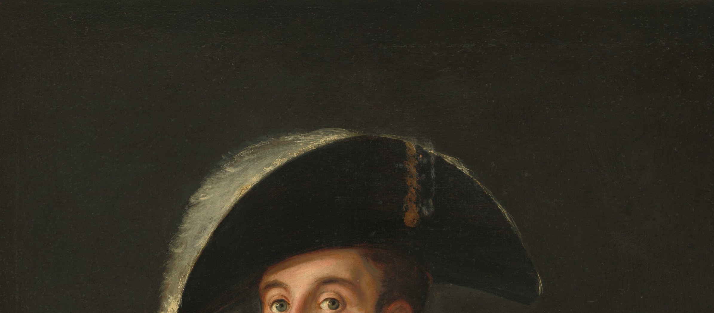 The hat's commanding size and cocked angle dominate the composition, immediately signaling military authority before the face is read.