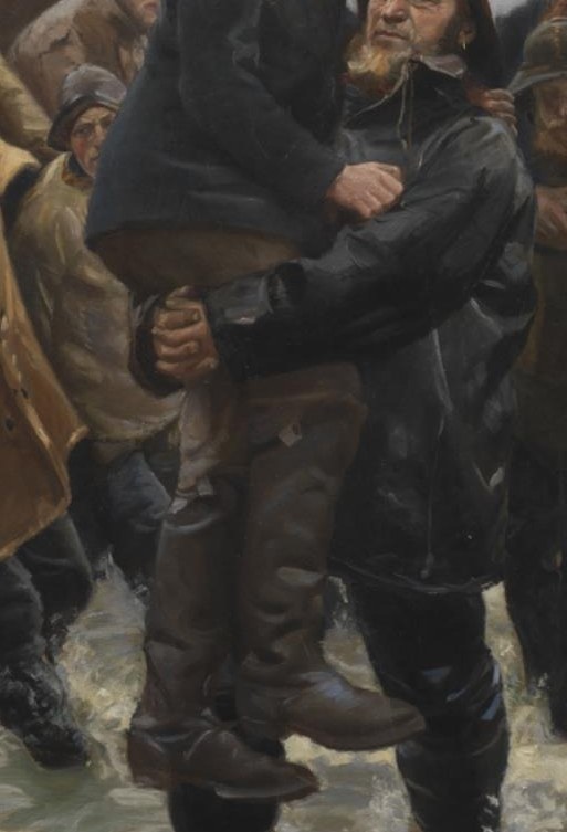 He carries a rescued man on his shoulders.