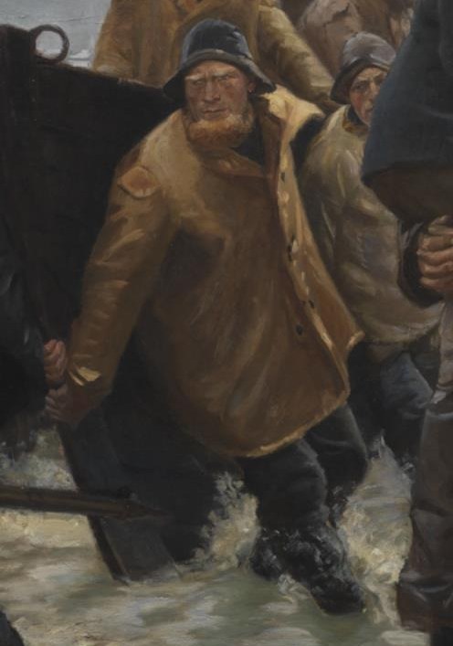This man wears a bright yellow coat.