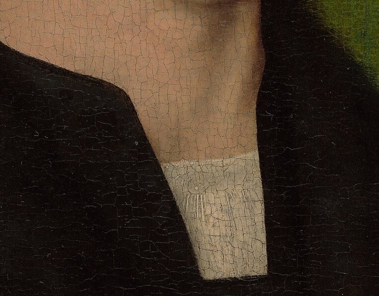 A single white collar anchors the neck. It is the only flash of linen in the whole composition.
