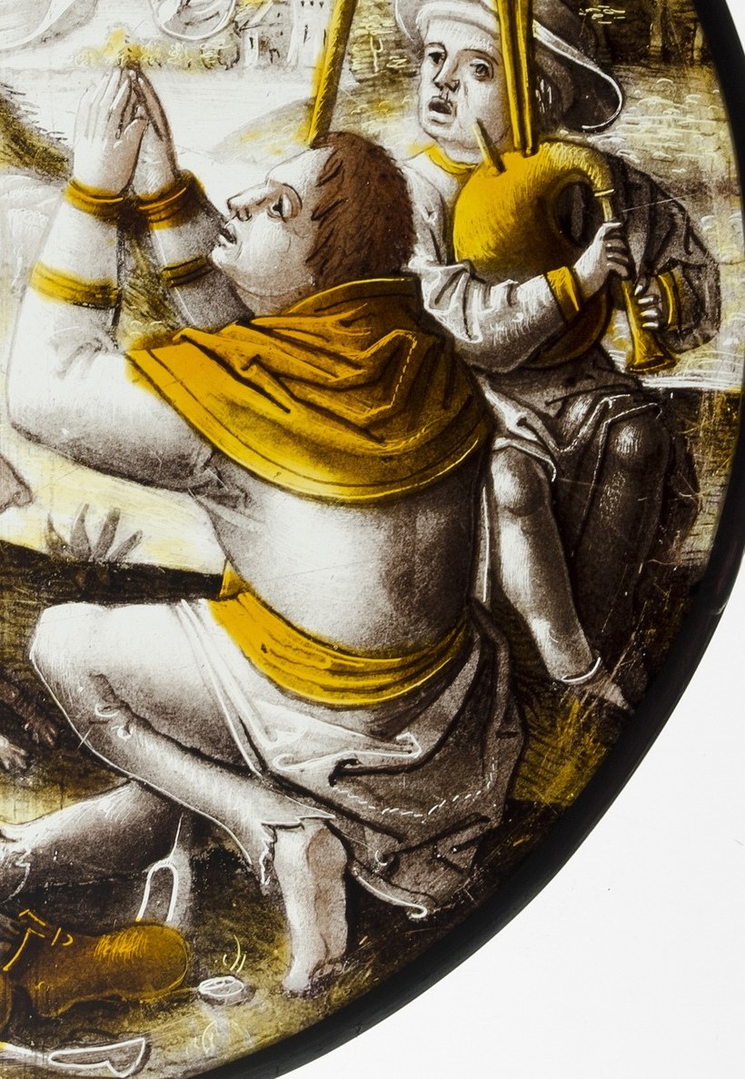 Contrasting posture to the kneeling figure , his composed stance with staff anchors the scene and his hat marks his worldly, humble identity.