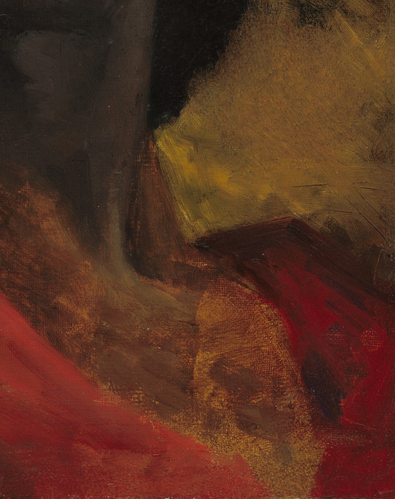 The vibrant red cloth suggests his high status.