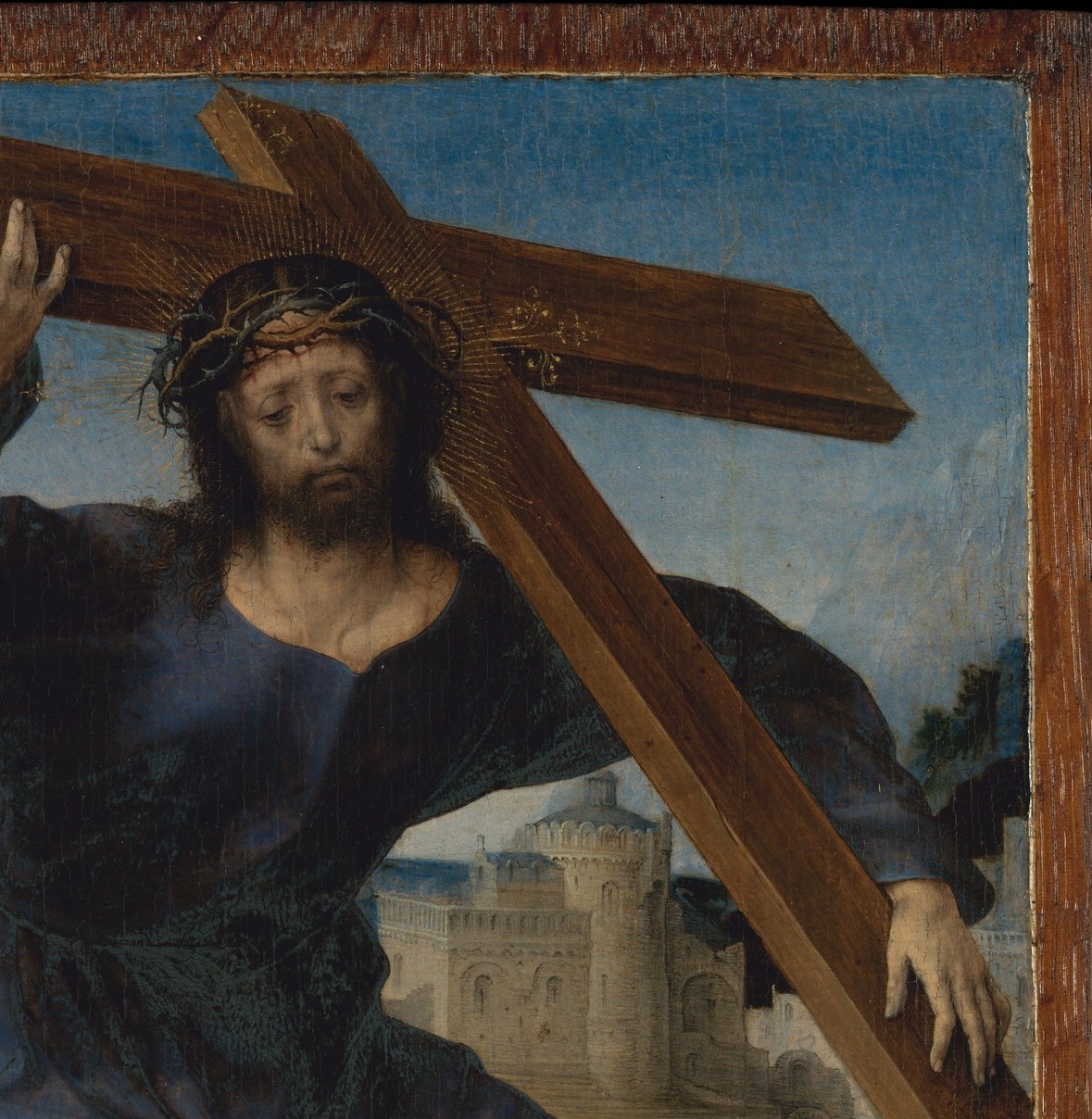 The cross is disproportionately large and dark, pressing down on the composition , weight made visible, formally reinforcing Christ's burden