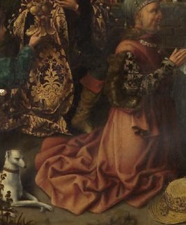 A kneeling Magus offers his gift with deep reverence.