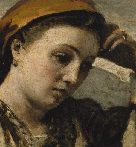 She seems lost in a quiet, deep thought.