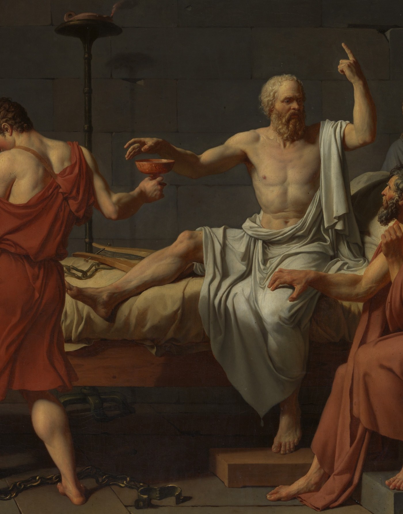 David's technical centerpiece: white fabric modeled in cool light against warm stone, making Socrates glow like a marble statue come to life, his body already half-monument