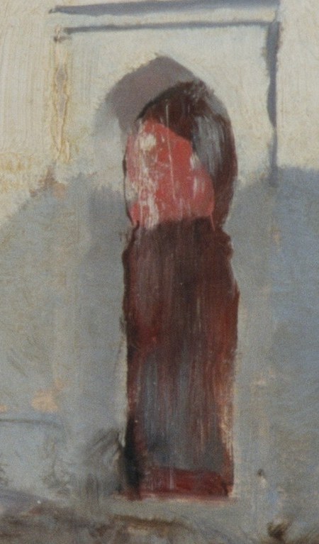The vibrant red and the play of light and shadow make this a focal point, hinting at a richly decorated space.