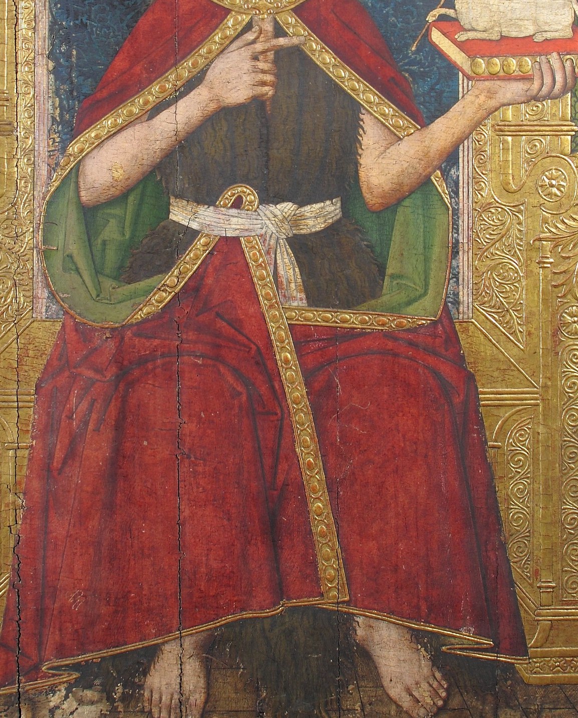 He is surrounded by rich colors and intricate details.