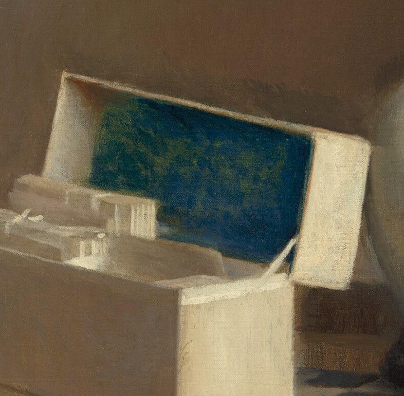 But on the table, an open box suggests a private world.