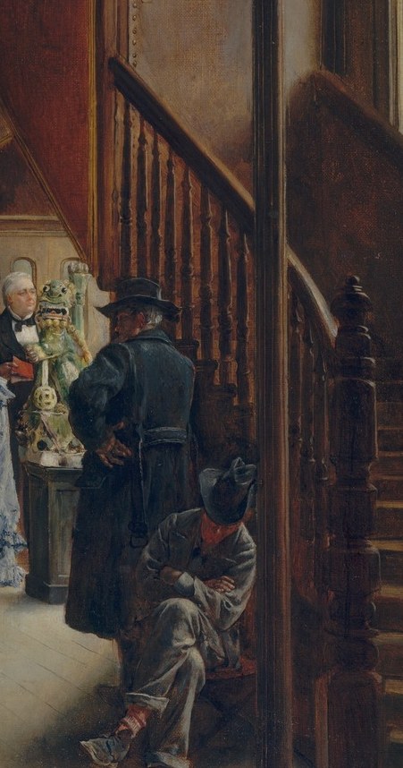 A woman in a light dress stands near the stairs, observing. She is not a bidder.