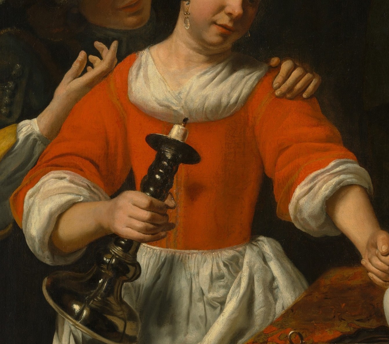 The saturated red dominates the palette; in Dutch Golden Age painting red signifies passion, worldly wealth, or vanitas , it commands the entire lower composition.