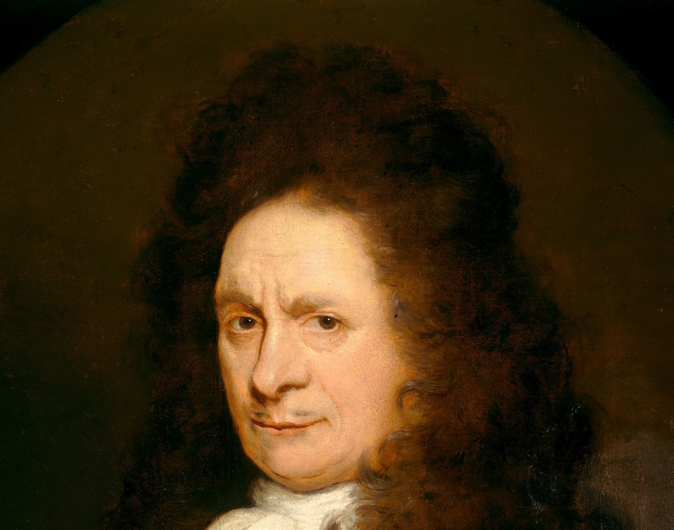 His long, curled hair dates the style to the 1670s.