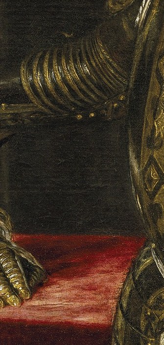 An attendant holds his helmet, he awaits command.