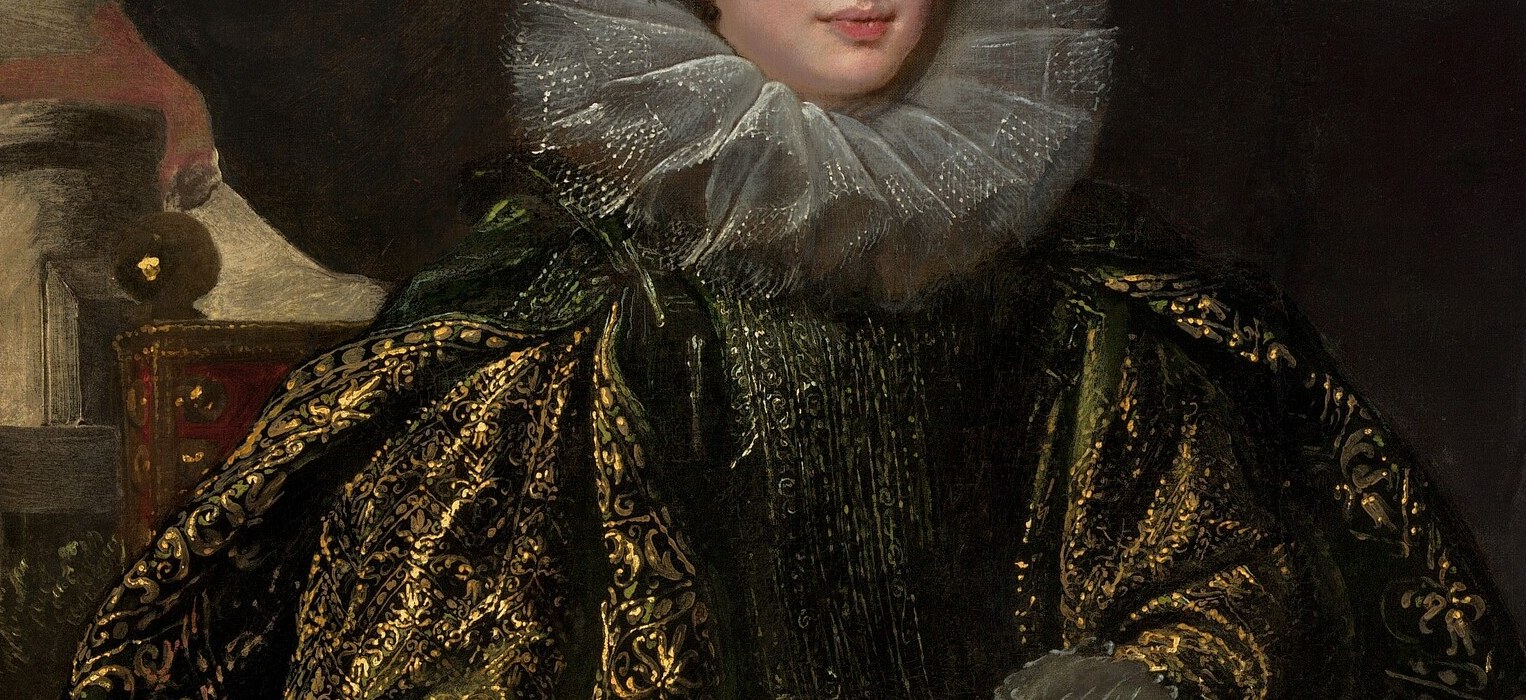 Her stiff lace ruff collar was a high fashion statement.