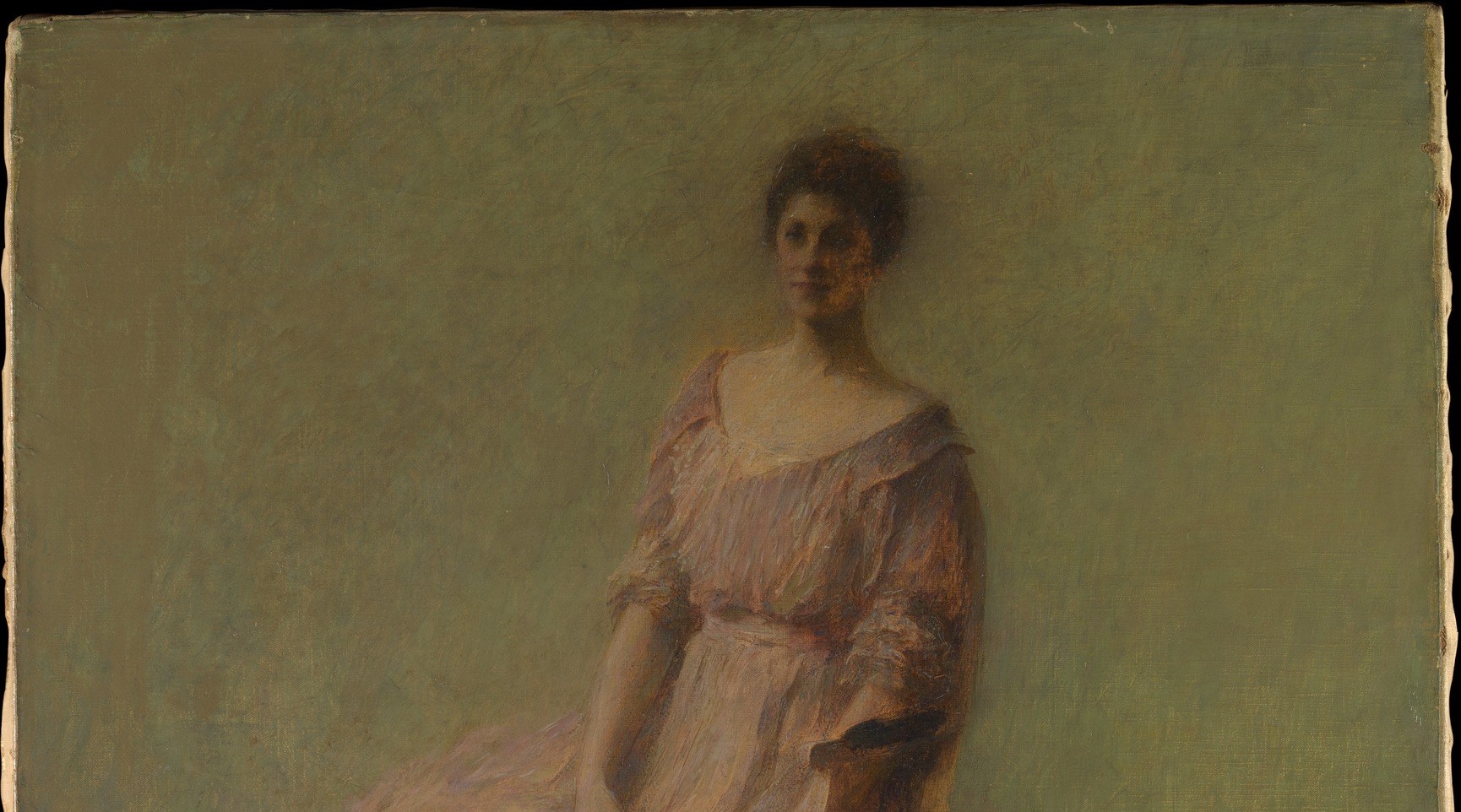 The muted background ensures your eye stays on her quiet contemplation.