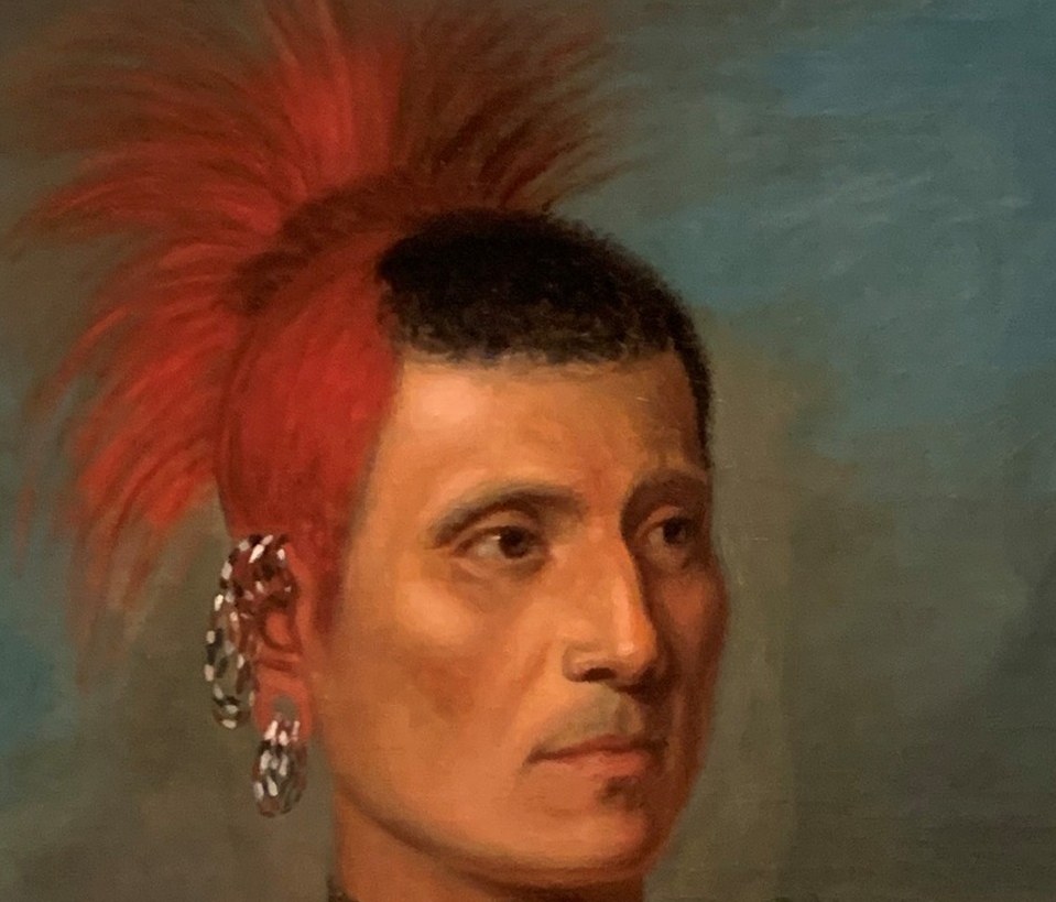 Every object on his body is a word in a language of rank and sovereignty.