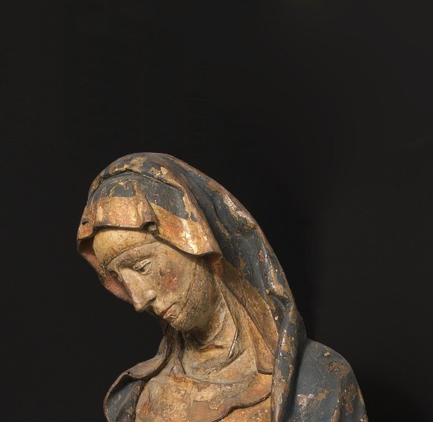 The stripped, pale stone we see was never the artist's intention.