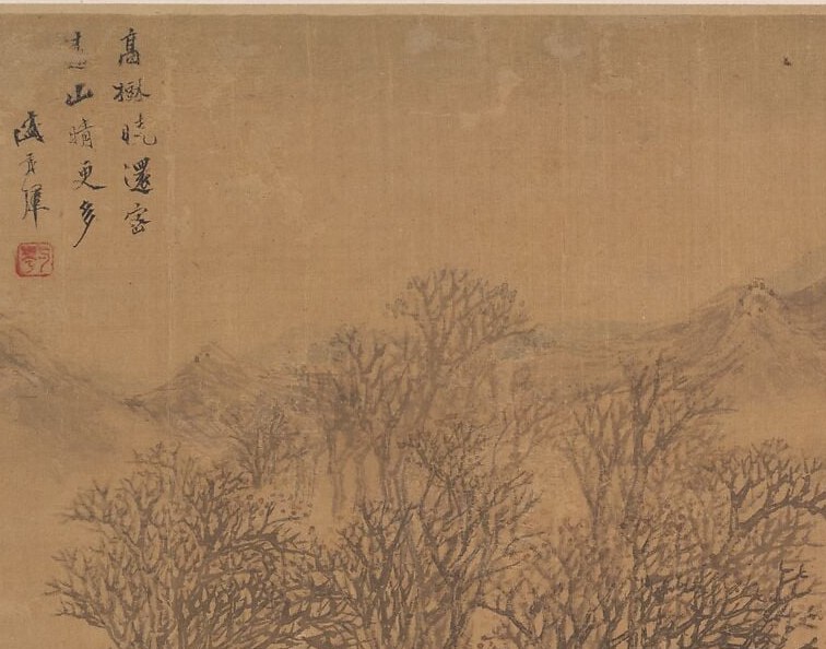 Bare branches, misty mountains, an open stretch of water.