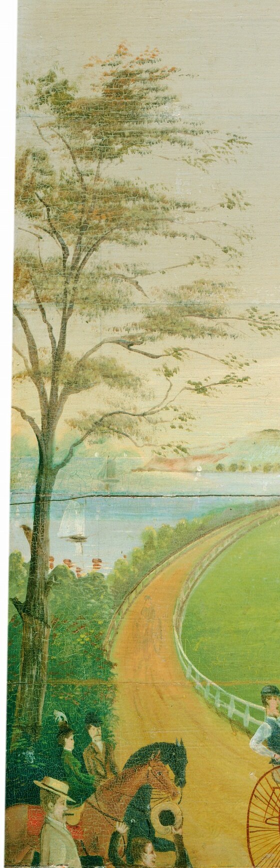 The bare branches and low wall suggest a simple, still scene.
