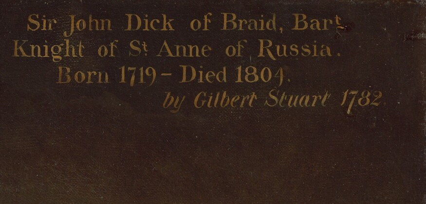 The name on the frame said another man entirely.