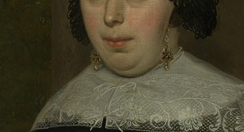 The intricate detail of the lace suggests wealth and status, a testament to the sitter's social standing.