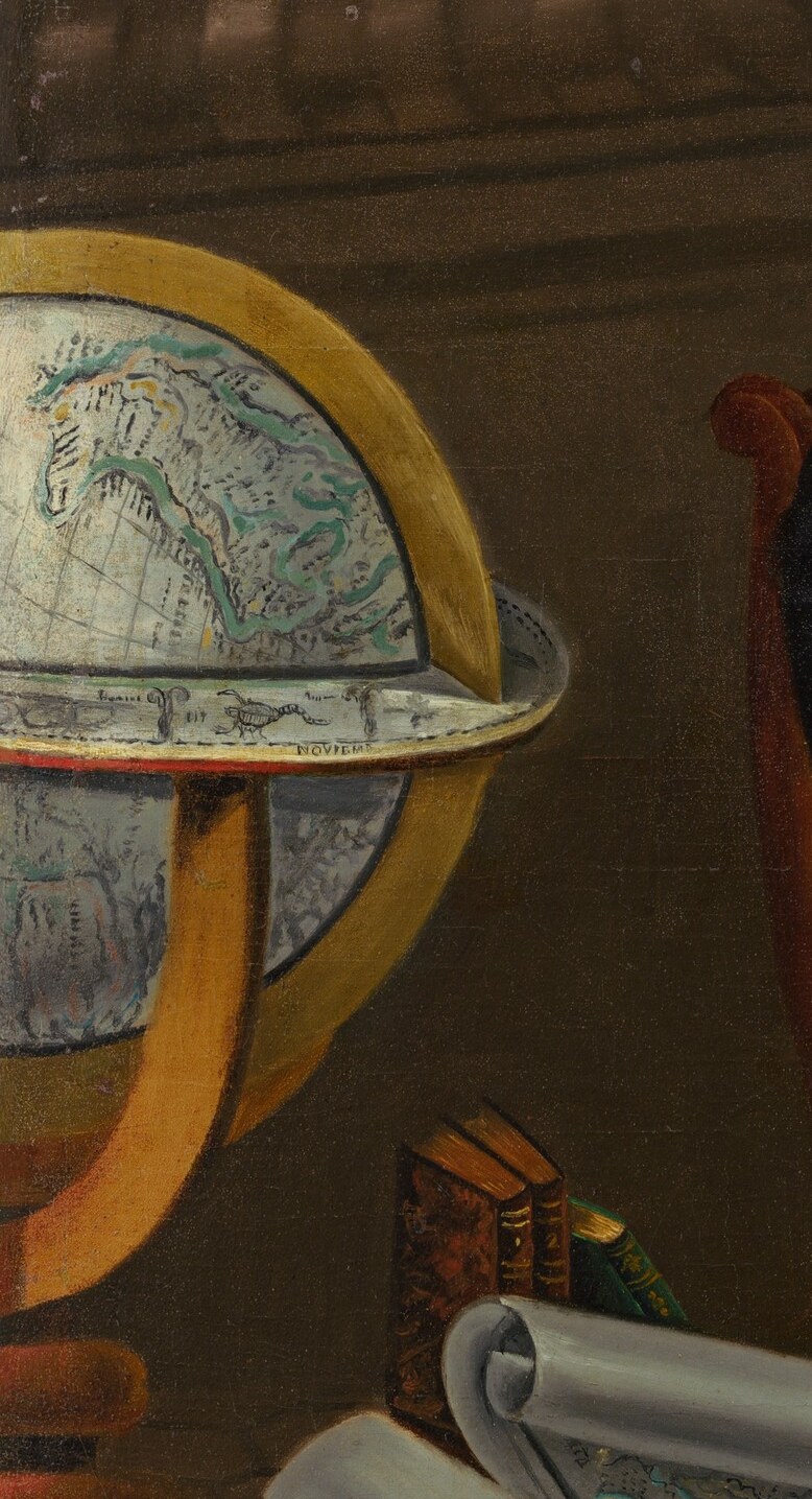 A globe, map, telescope, and microscope fill his world.