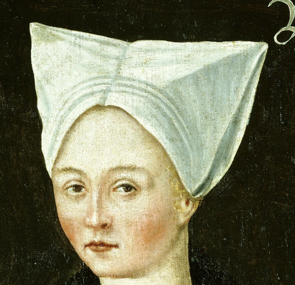 The crisp folds of the cap create a strong geometric shape, highlighting the sitter's profile.