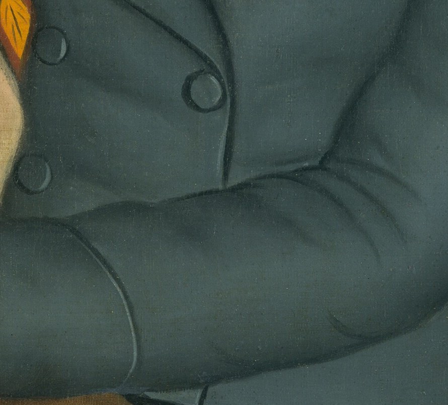 He holds a book, a marker of status then.