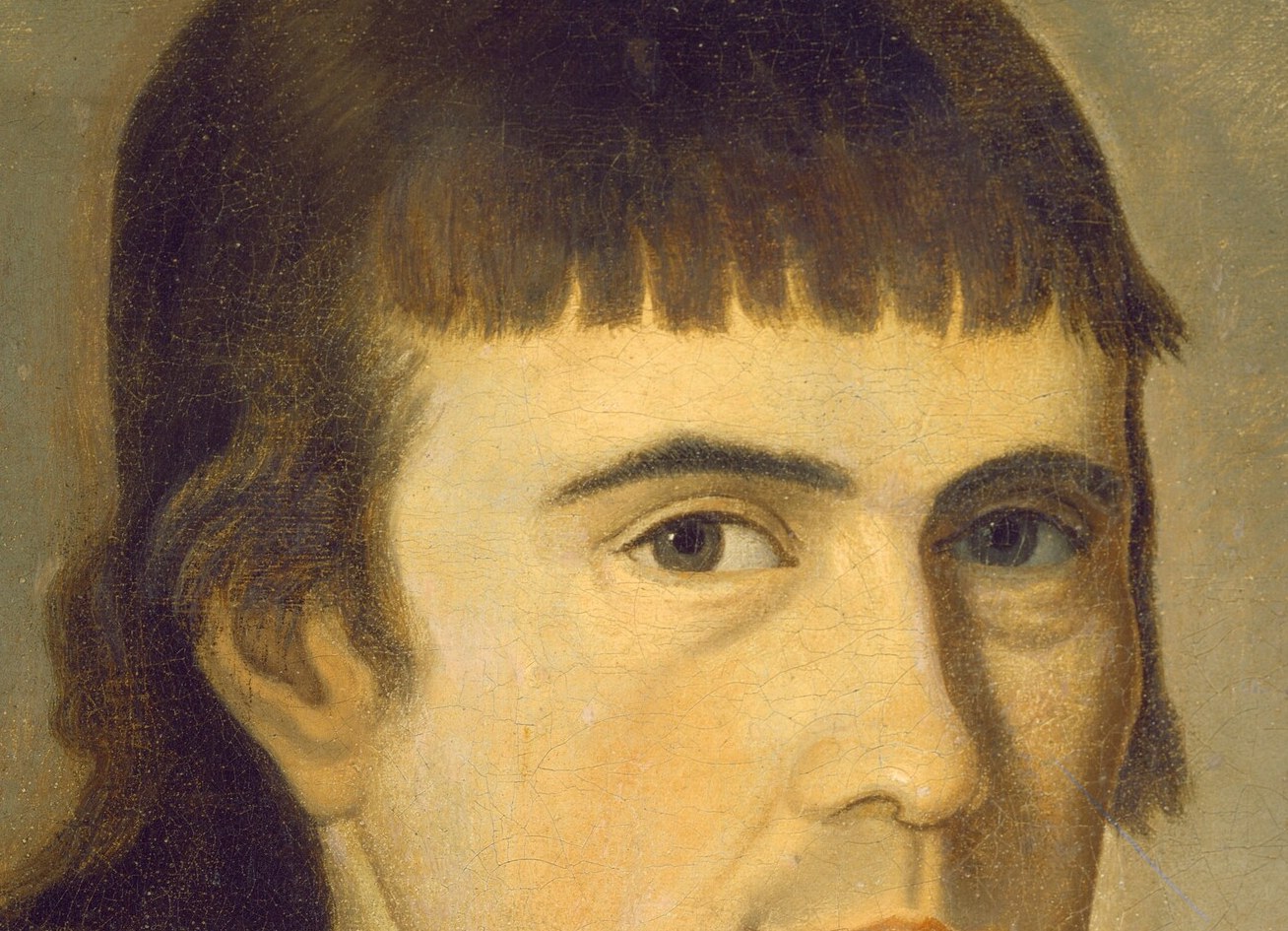 But look closely at his distinct dark hair.