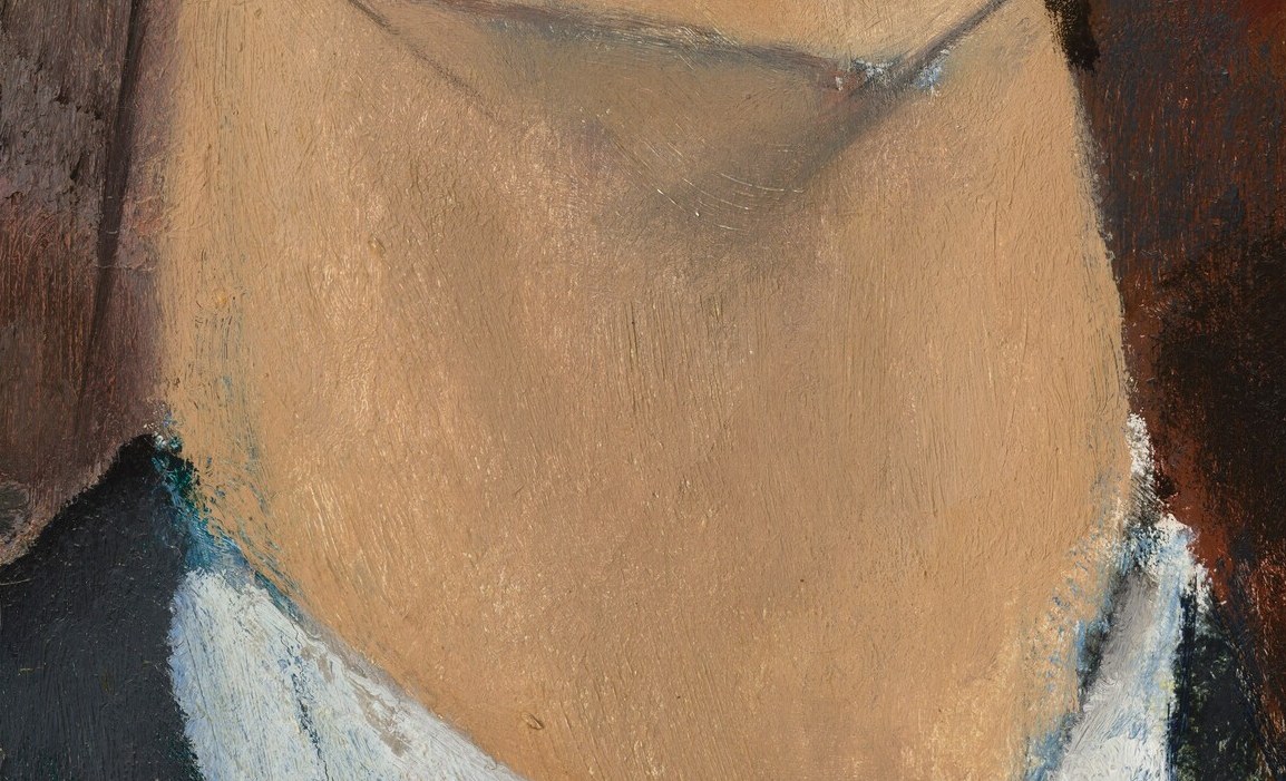 The face tapers to this sharp, almost geometric chin.